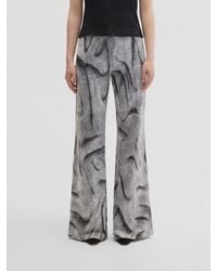 MACCAPANI - Easy Flared Trousers - Lyst