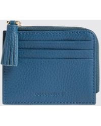 Coccinelle - Tarjetero Tassel De Piel Granulada - Lyst