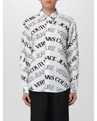 Versace - Camicia in popeline di cotone con logo all over - Lyst