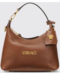 Versace - Smooth Calfskin Leather Mini Hobo Bag With Charm And Lettering Logo - Lyst