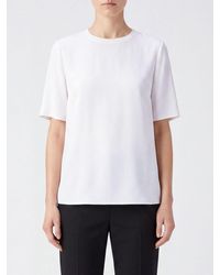 JOSEPH - Crewneck Short-Sleeved Silk Blouse With A Minimalist Design - Lyst