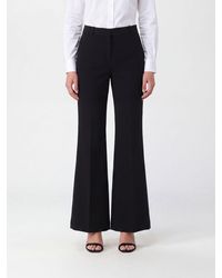 The Row - Lind Flared Wool Trousers With Mid-Rise Waist And Belt Loops - Lyst