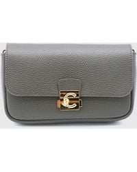 Coccinelle - C-Me Lock Mini Pebbled Leather Shoulder Bag With Buckle Closure - Lyst