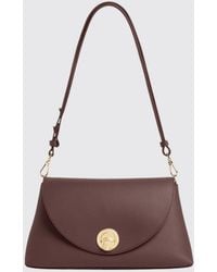 Coccinelle - Nikla Tumbled Leather Shoulder Bag With Flap Closure - Lyst