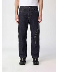 Undercover - Straight Fit Stretch Denim Jeans With Slogan Print And Mid-Rise Waist - Lyst