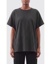 KHAITE - Relaxed-Fit Cotton Crewneck T-Shirt With Dropped Shoulders - Lyst