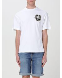Calvin Klein - T-shirt con fiore - Lyst