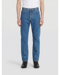 Balmain - Cotton Denim Straight Jeans - Lyst