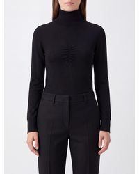 SOLOTRE - Schmal Geschnittener Rollkragenpullover Von Aus Wolle Mit Rippbündchen - Lyst