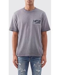 Amiri - Crew Neck Cotton T-Shirt With Graphic Logo Print And Dropped Shoulders - Lyst