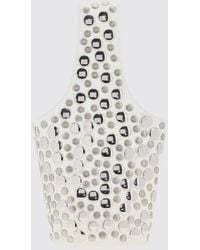 KHAITE - Livia Studded Lambskin Handbag With A Flared Shape - Lyst