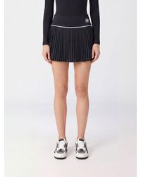 Amiri - Pleated Jersey Mini Skirt With Embroidered Monogram - Lyst