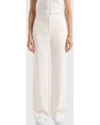 Genny - High-Waisted Wide-Leg Linen Trousers With Slash Pockets - Lyst
