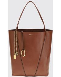 Chloé - Chlo&Eacute Spin Grained Calfskin Tote Bag With Logo Charm - Lyst