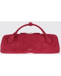 Alaïa - Le Teckel Suede Sheepskin Handbag With Logo Charm - Lyst