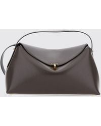 TOTEME - T-Lock Flared Leather Handbag With A Signature Turn-Lock Closure - Lyst