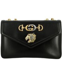 gucci lion clutch