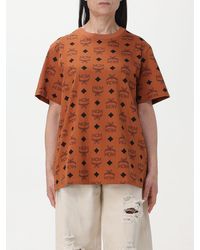 MCM - T-shirt in cotone con logo all over - Lyst