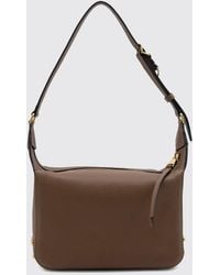 Tod's - Metal Dots Hammered Leather Shoulder Bag With Embossed Logo - Lyst