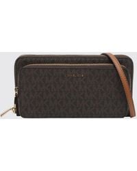 Michael Kors - Sac Jet Set En Coton Enduit Avec Monogramme Mk Imprimé - Lyst