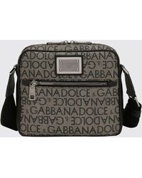 Dolce & Gabbana - Borsa in tessuto spalmato con logo all over - Lyst