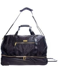 Class Roberto Cavalli Drop Bottom Rolling Duffel Bag in Black | Lyst