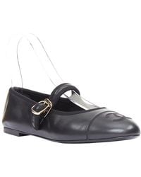 CHANEL - Lambskin Stitched Cc Cap Toe Flat (Authentic Pre-Loved) - Lyst