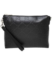 Gucci - GG Embossed Medium Canvas & Leather Messenger Bag - Lyst