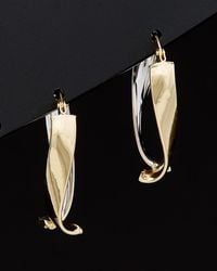 Italian Gold - 14k Two-tone Twisted Oval Hoops - Lyst