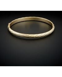 Italian Gold - 14k Polished Twisted Bangle - Lyst