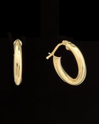 Italian Gold - 14k Twist Oval Hoops - Lyst