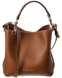 Gucci - GG Mini Emblem Leather Bucket Bag - Lyst