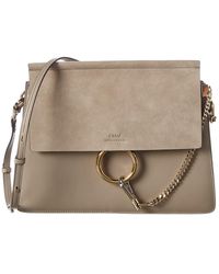 la rue distressed studded shoulder bag