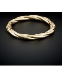 Italian Gold - 14k Polished Twisted Bangle - Lyst