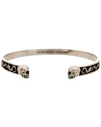 Alexander McQueen Engraved Twin Skull Brass Bracelet - Metallic