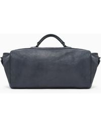 Giorgio Armani - Vintage-Effect Pebbled Nappa-Leather Duffel Bag - Lyst