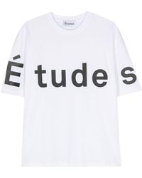 Etudes Studio - T-shirt bianca con scritta logo - Lyst