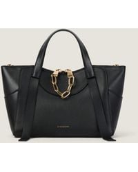 Givenchy - Borsa The Snatch piccola in pelle fiore - Lyst