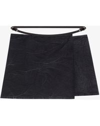 Givenchy - Mini jupe portefeuille Voyou en denim - Lyst