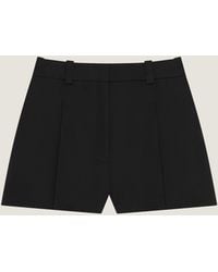 Givenchy - Short à plis en laine - Lyst