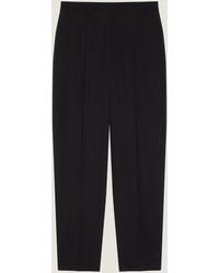 Givenchy - Tailored Double Pleat Trousers - Lyst