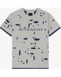 Givenchy - T-shirt oversize in cotone effetto destroyed - Lyst