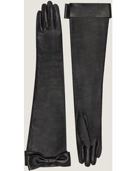 Givenchy - Guanti lunghi in nappa con fiocco - Lyst