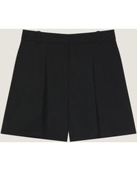 Givenchy - Pleated Back Shorts - Lyst