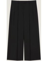 Givenchy - Cropped Double Pleat Pants - Lyst