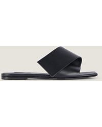 Givenchy - Sandali piatti Sliced Square in pelle - Lyst