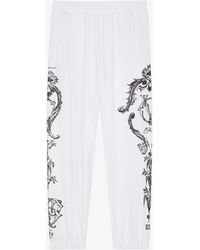 Givenchy - Pantaloni da jogging Crest in tessuto garzato - Lyst