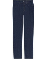 Givenchy - Jeans slim in denim - Lyst