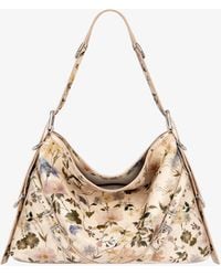Givenchy - Borsa Voyou media in pelle con stampa floreale - Lyst