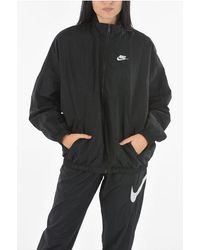 Nike - 2 Pockets Oversized Windbreaker Jacket With Zip Closure - Lyst